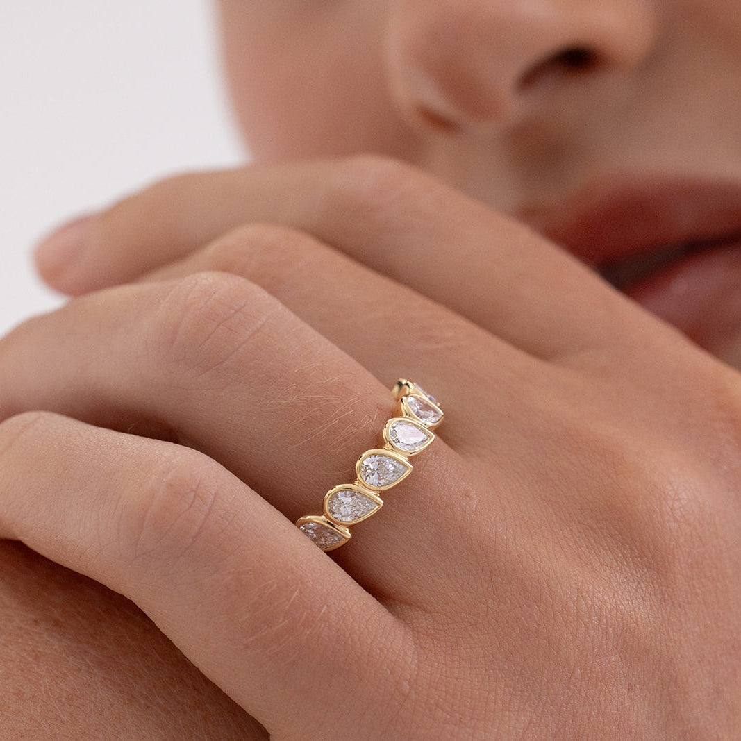 Ada east west pear diamond wedding ring in 18K gold by Matthews Jewellers Newcastle