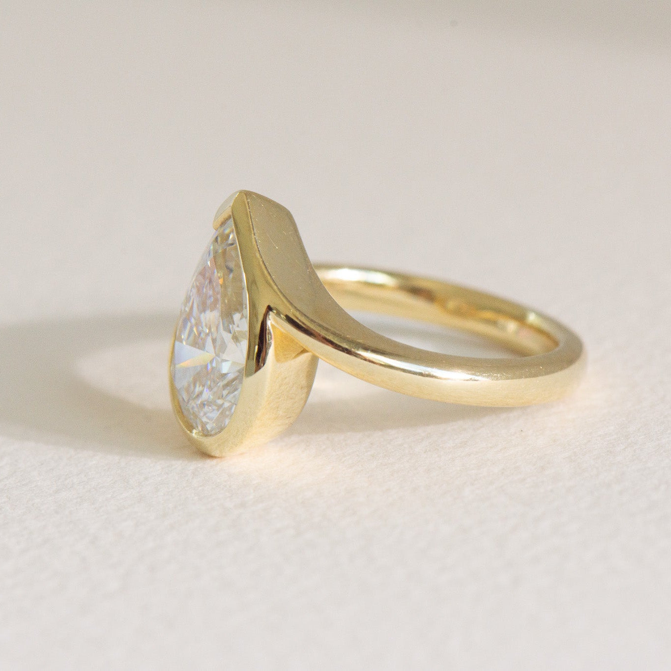 Lola lab grown diamond pear engagement ring in 18k gold, handcrafted by Matthews Jewellers