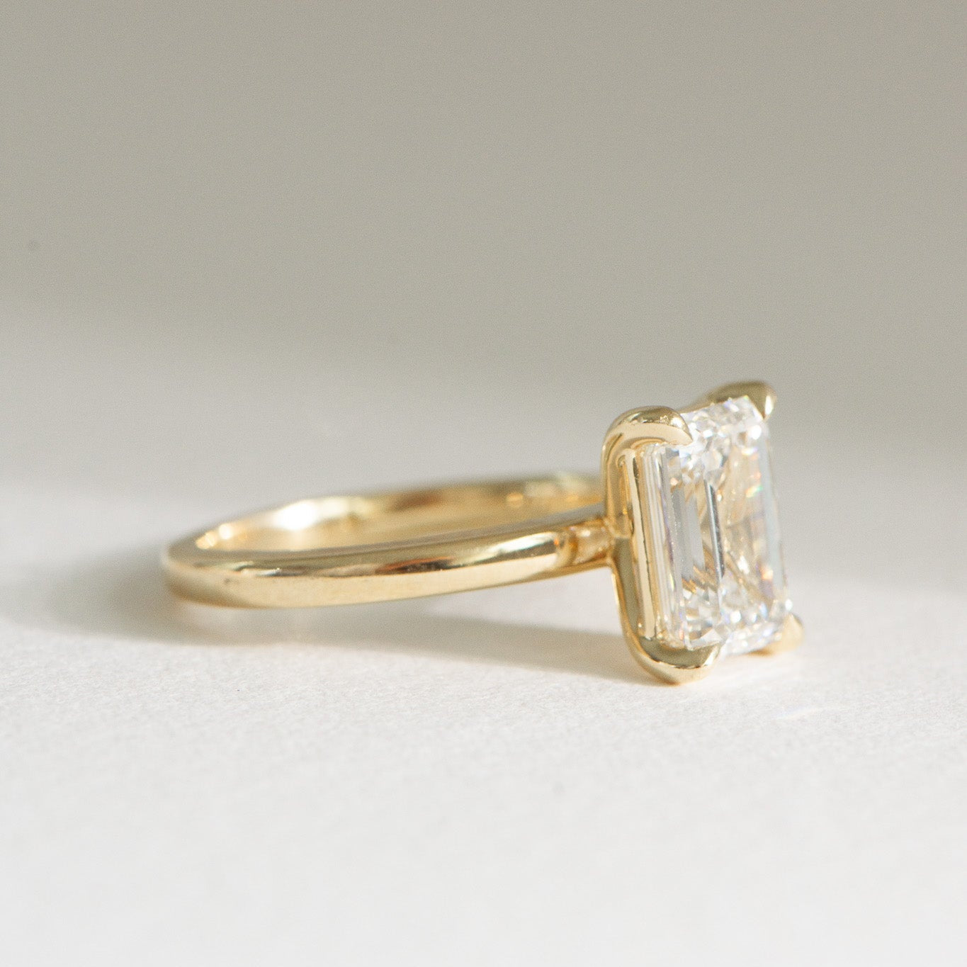 Edith | 3ct Emerald Cut Lab Diamond Engagement Ring – Side profile view, Matthews Jewellers Newcastle