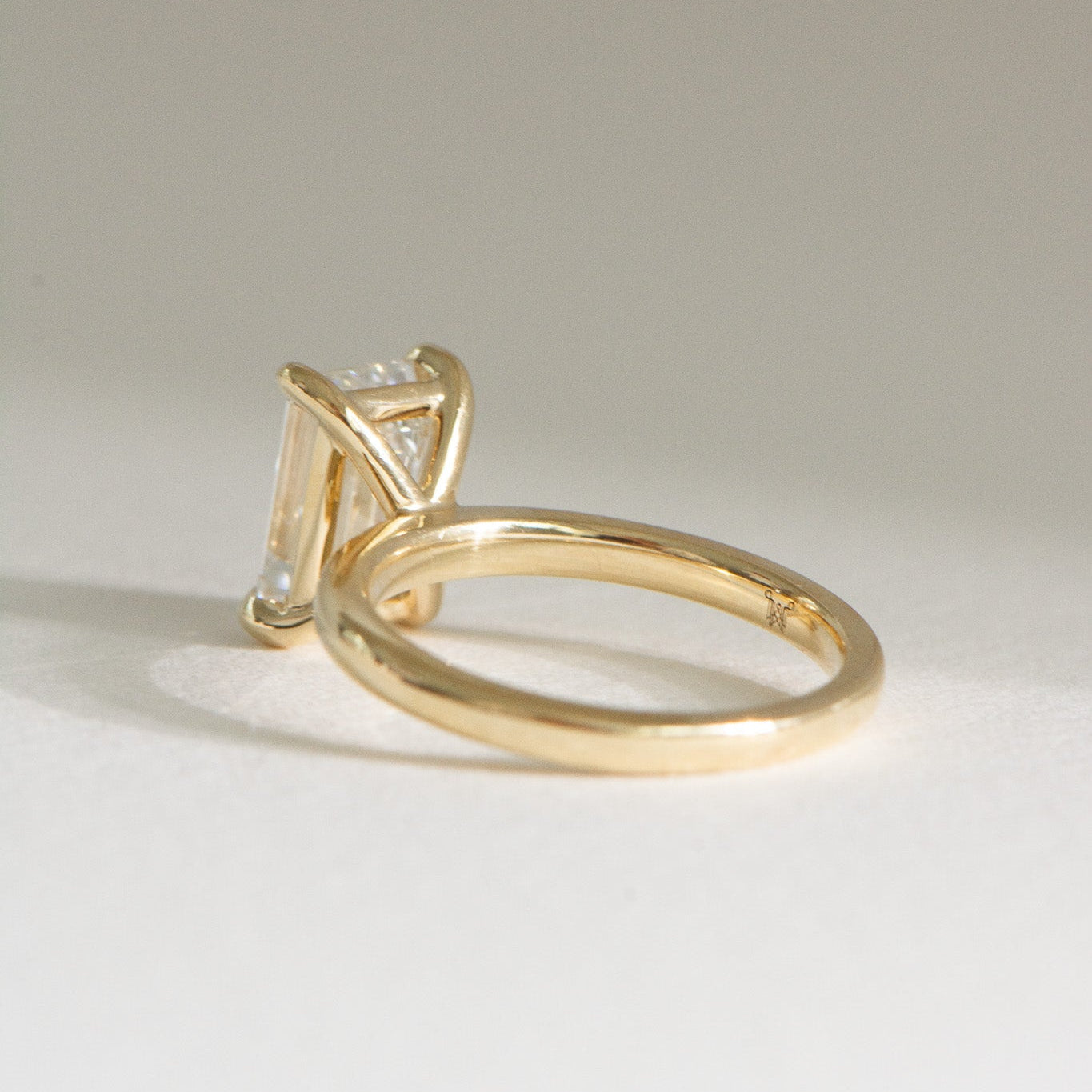 Edith | 3ct Emerald Cut Lab Diamond Engagement Ring – On hand view, Matthews Jewellers Newcastle