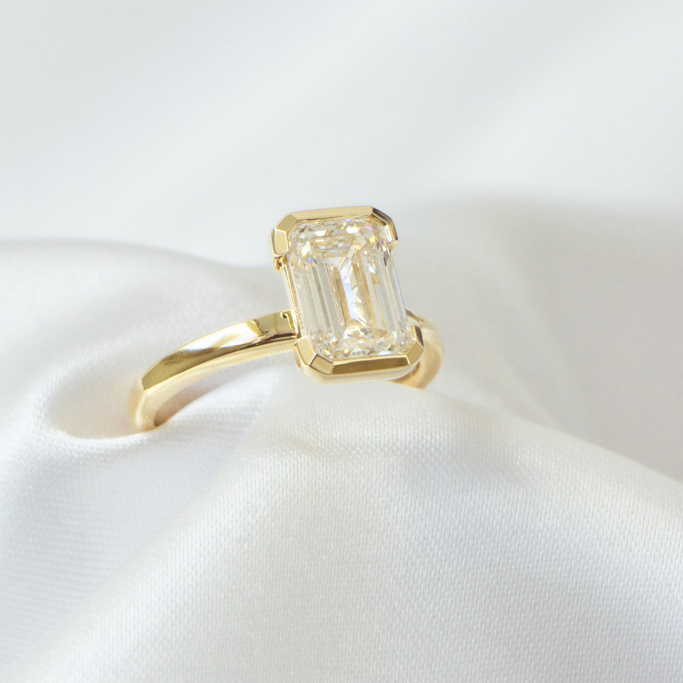 Edith Half Bezel Emerald Cut Engagement Ring – Matthews