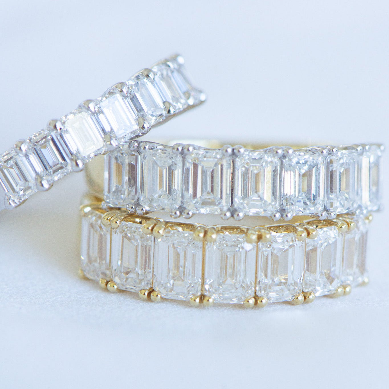 Medium Estelle wedding ring in 18K gold featuring 7 emerald cut lab-grown diamonds