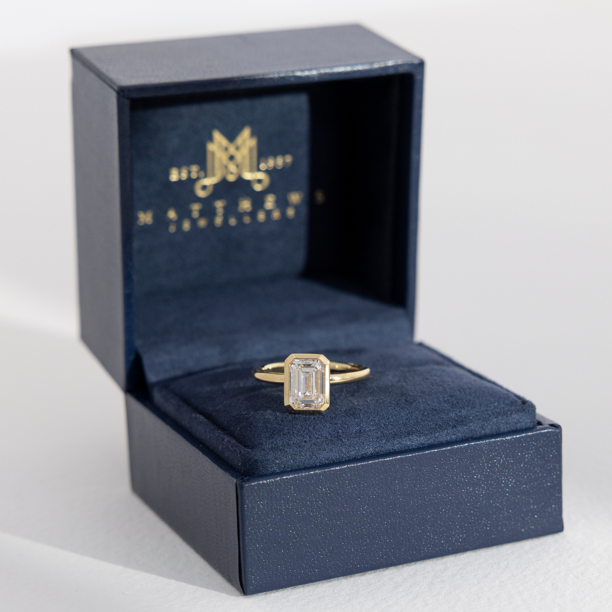 Bezel Edith | Emerald Bezel Diamond Engagement Ring