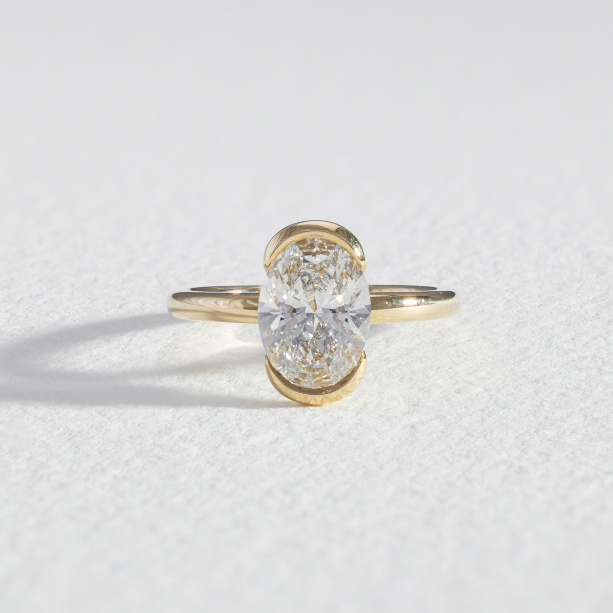 Half Bezel Helena | Oval Half Bezel Diamond Engagement Ring