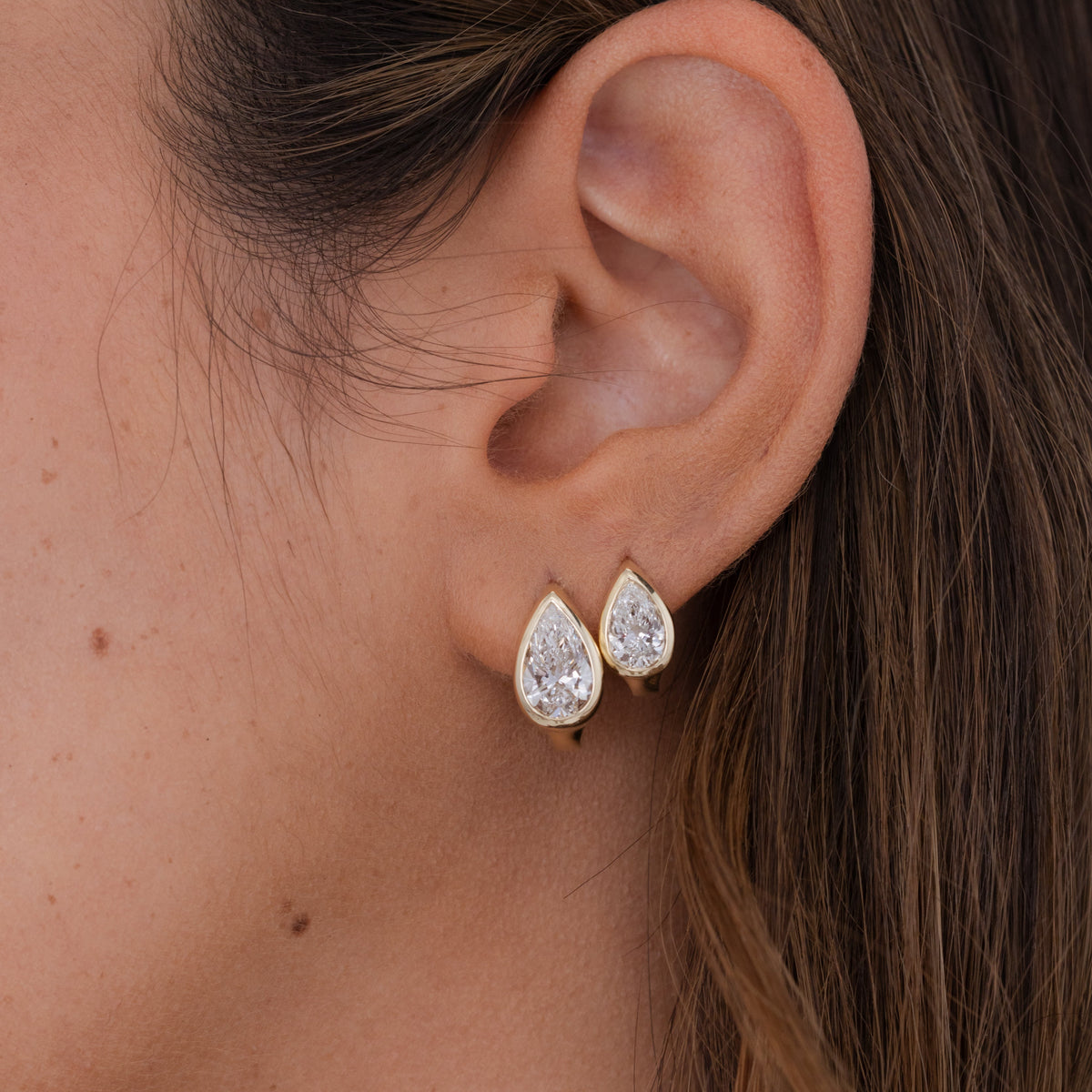 Aria Bezel Pear Diamond Huggies