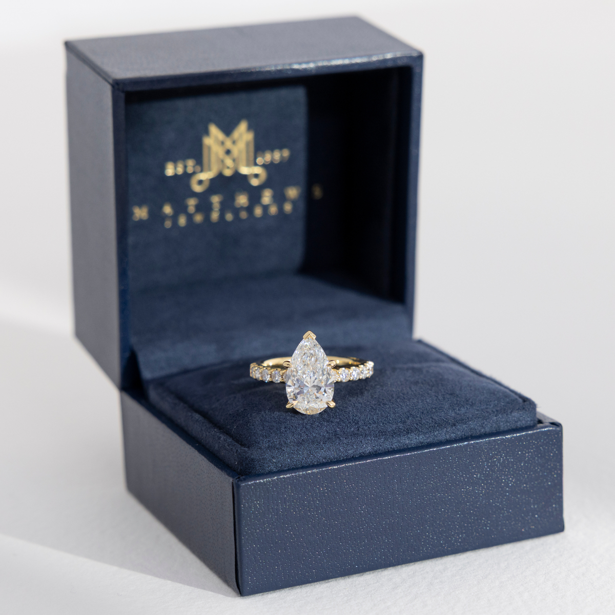 Pavé Nora | Pear Diamond Engagement Ring with Diamond Band