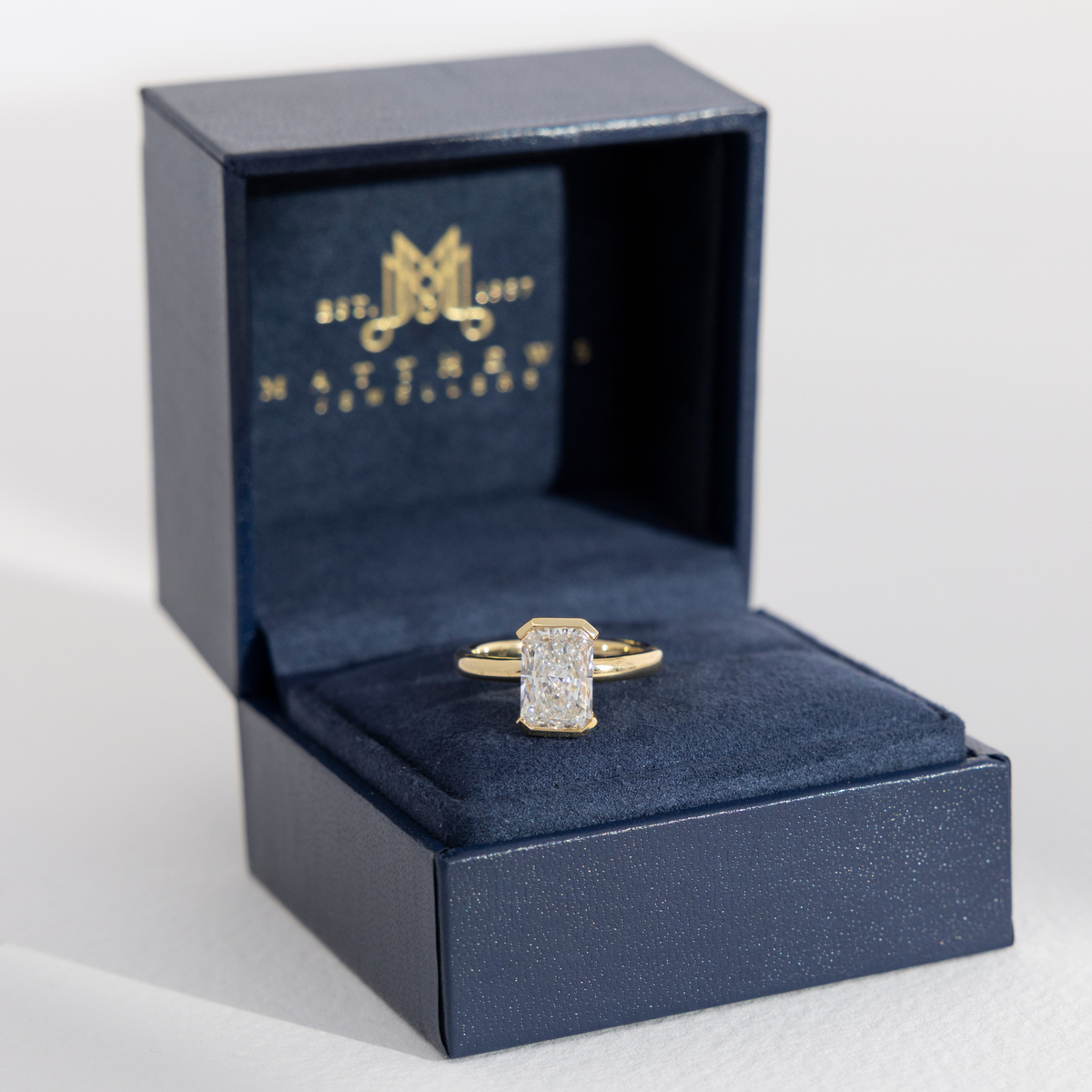 Half Bezel Sofia | Radiant Diamond Engagement Ring