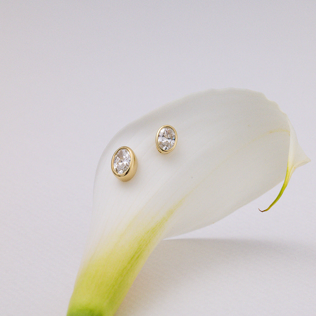 Oval Bezel Diamond Studs