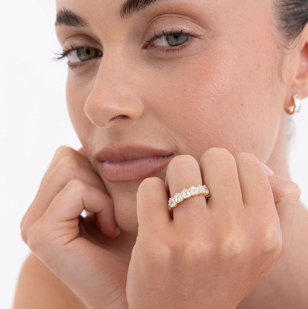 Asscher diamond ring in 18K gold set with 7 asscher cut lab-grown diamonds