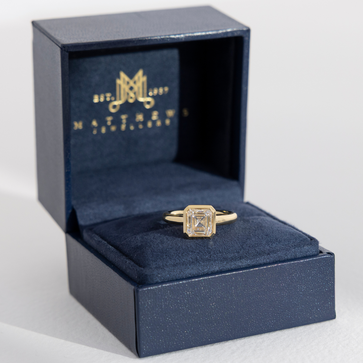 Clea | Asscher Cut Diamond Bezel Engagement Ring