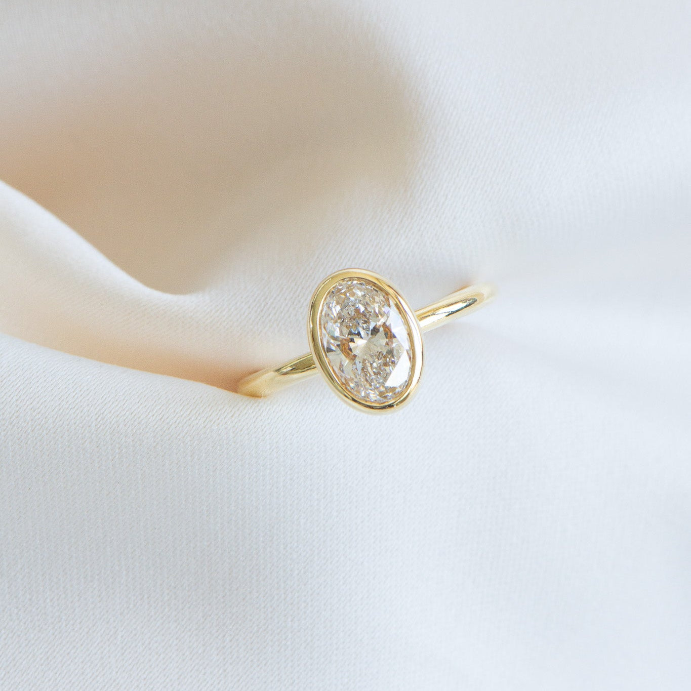 Helena | 1.56ct Bezel Oval Engagement Ring