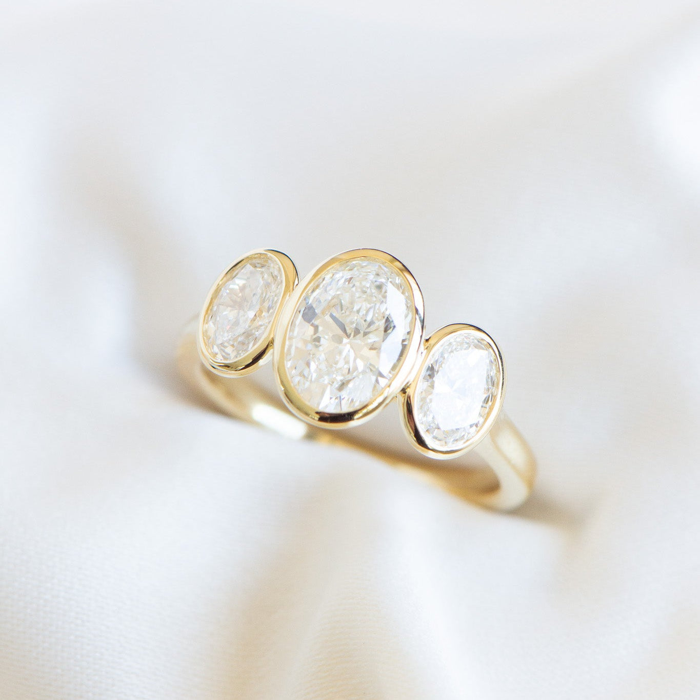 Mae | 2.19ct Bezel Three Stone Oval Engagement Ring