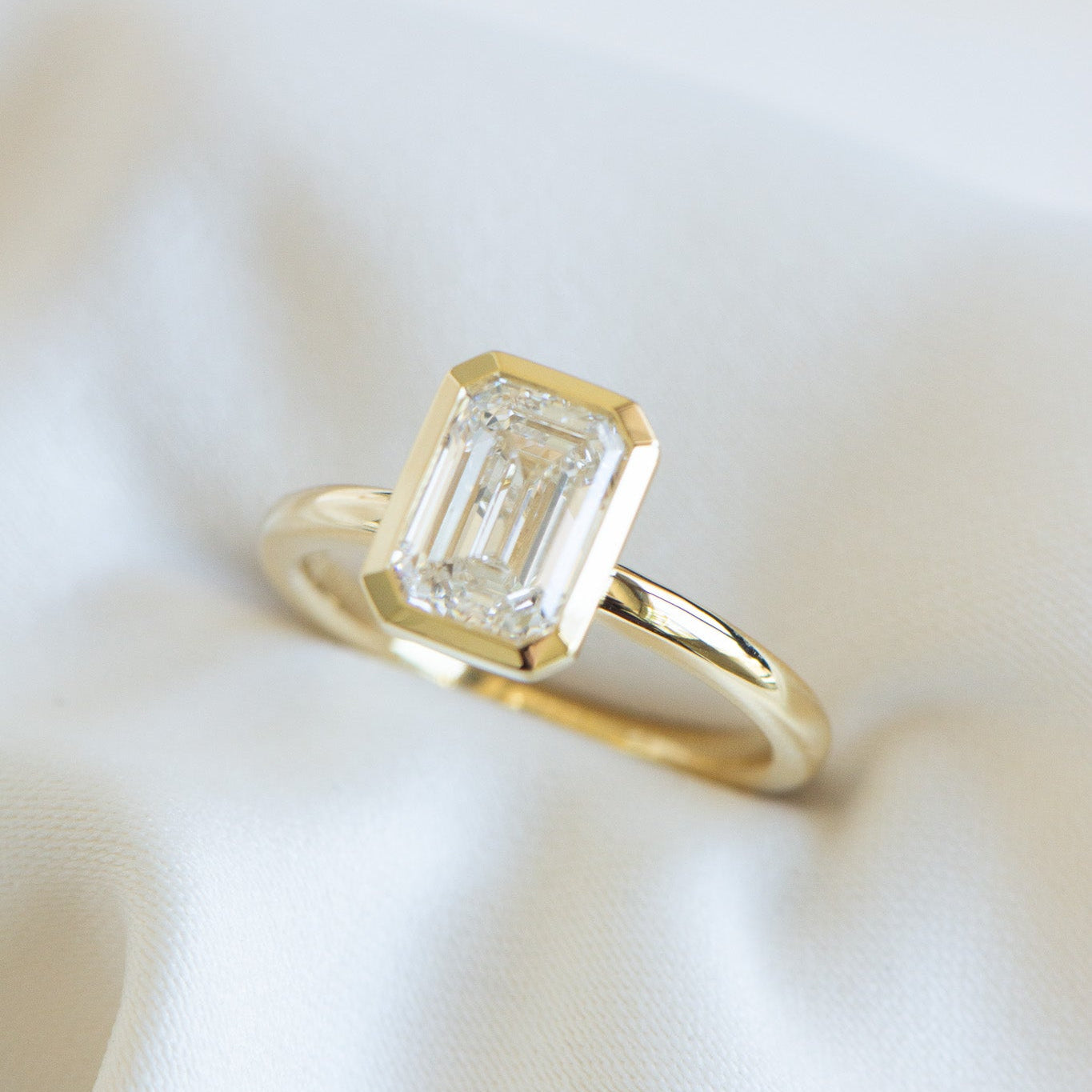 Edith | 2.04ct Bezel Emerald Cut Engagement Ring
