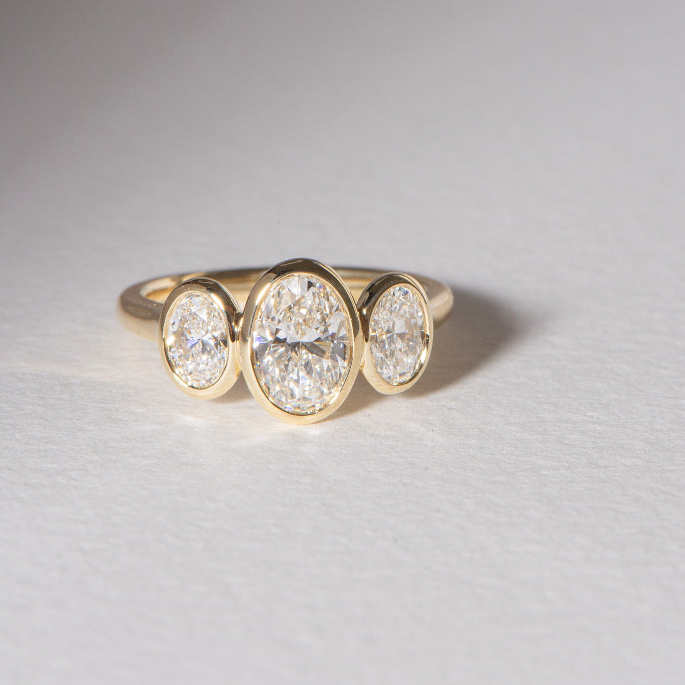 Mae | 2.19ct Bezel Three Stone Oval Engagement Ring