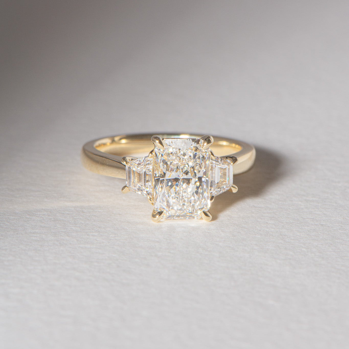 Sia | Three Stone Radiant and Emerald Cut Engagement Ring