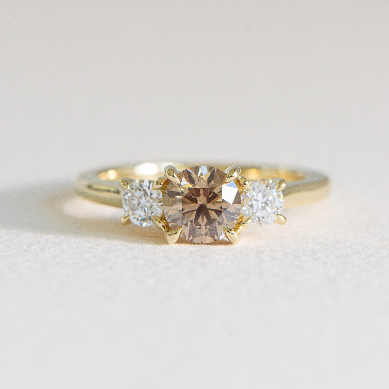Laila | Natural Champagne Three Stone Round Engagement Ring