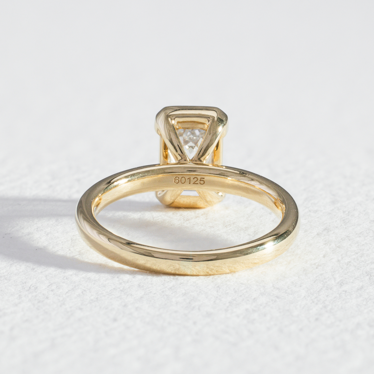 Half Bezel Edith | Emerald Diamond Engagement Ring