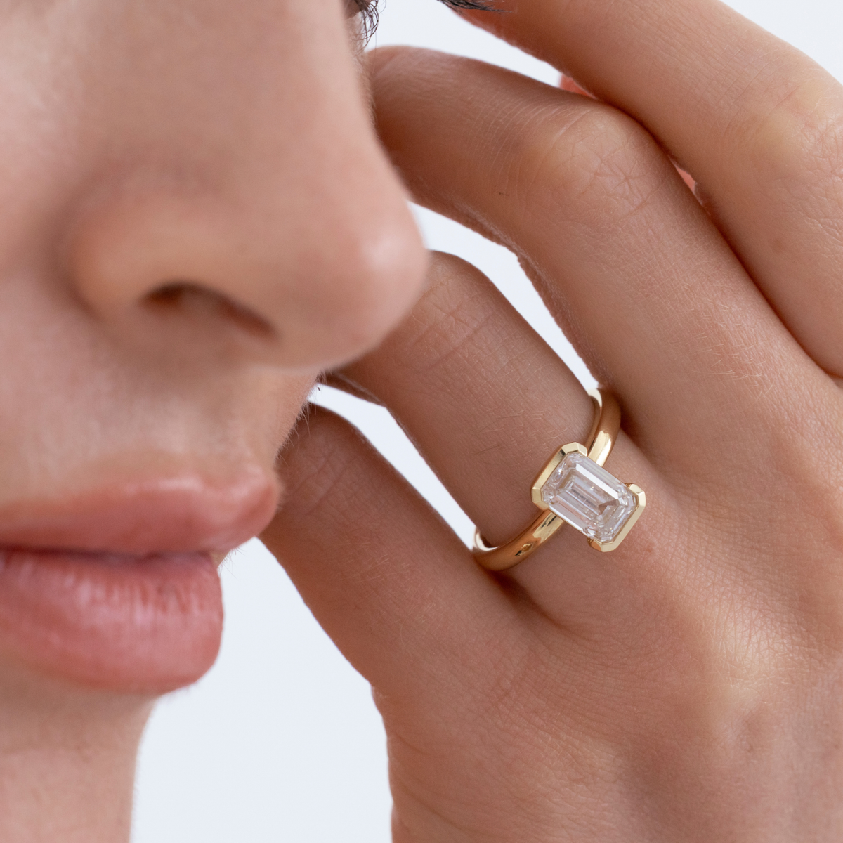Half Bezel Edith | Emerald Diamond Engagement Ring