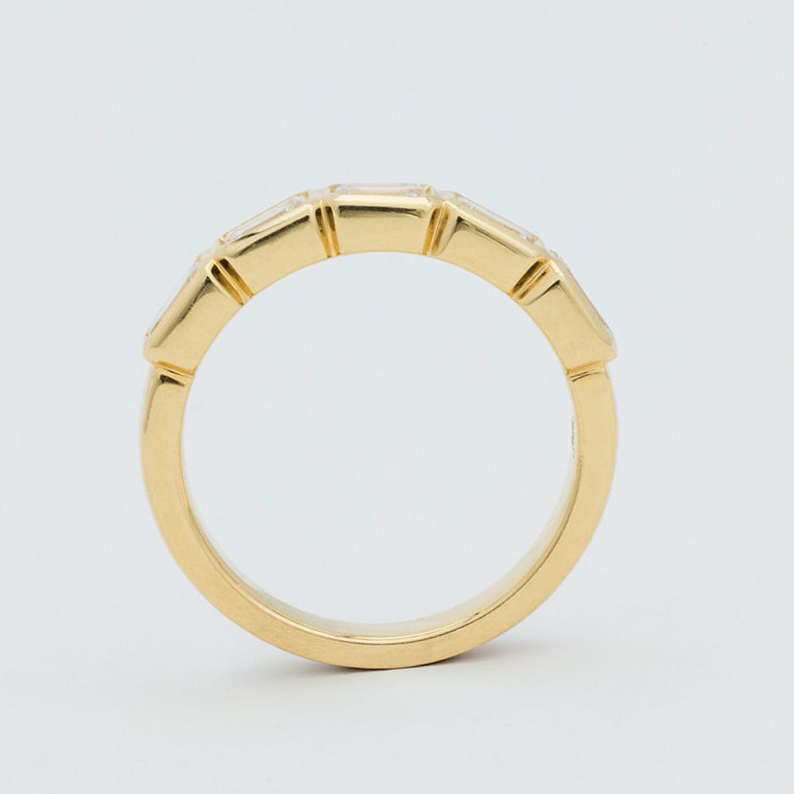 Emra east west lab-grown emerald diamond wedding ring in 18K gold from Matthews Jewellers Newcastle