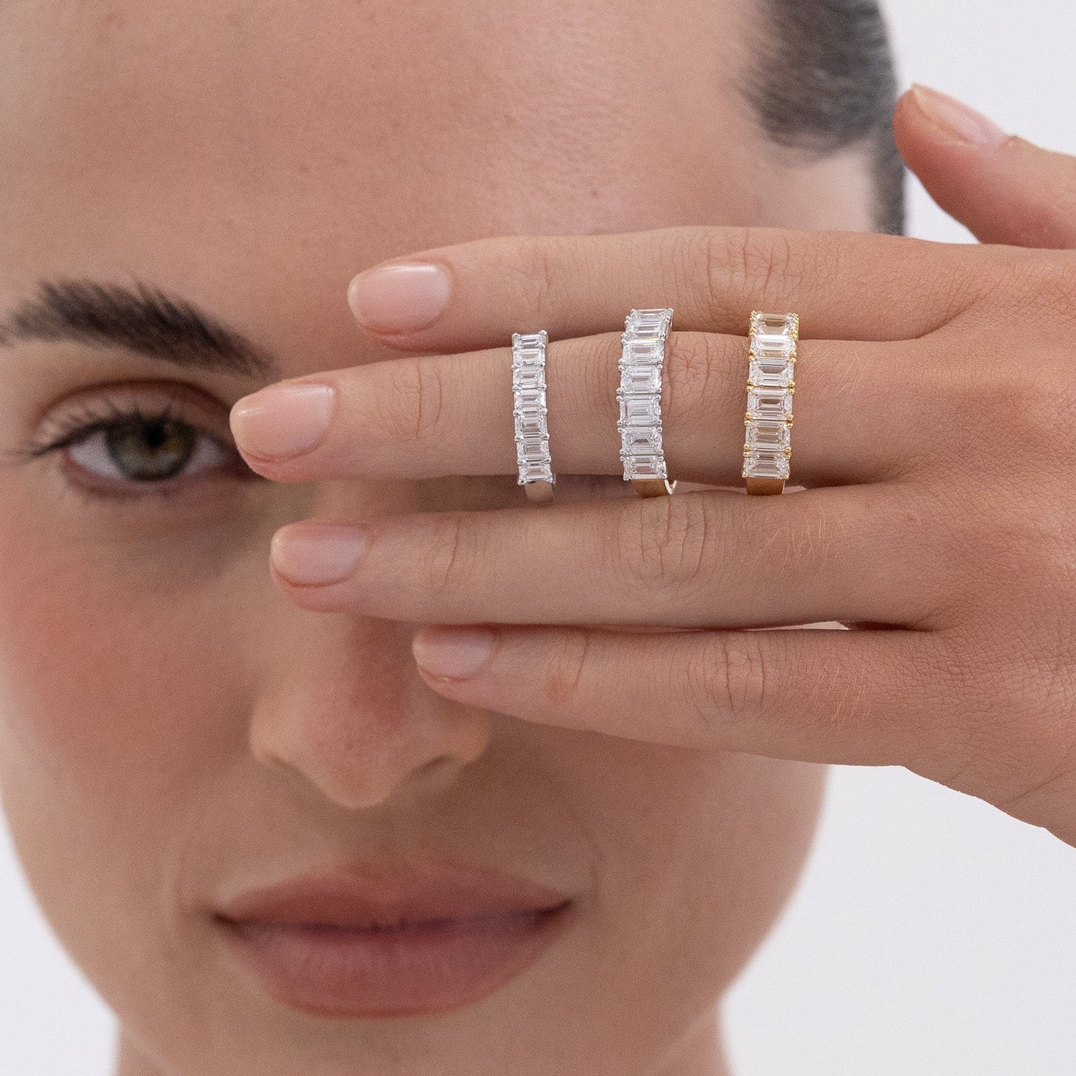 18K yellow gold Estelle emerald cut diamond wedding band with 7 lab-grown diamonds
