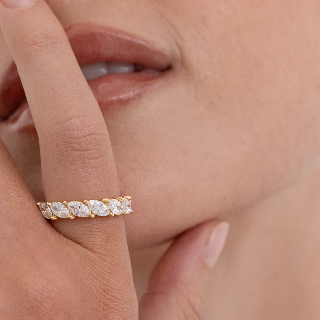 Eve marquise diamond wedding ring in 18K gold featuring 7 claw-set lab-grown diamonds