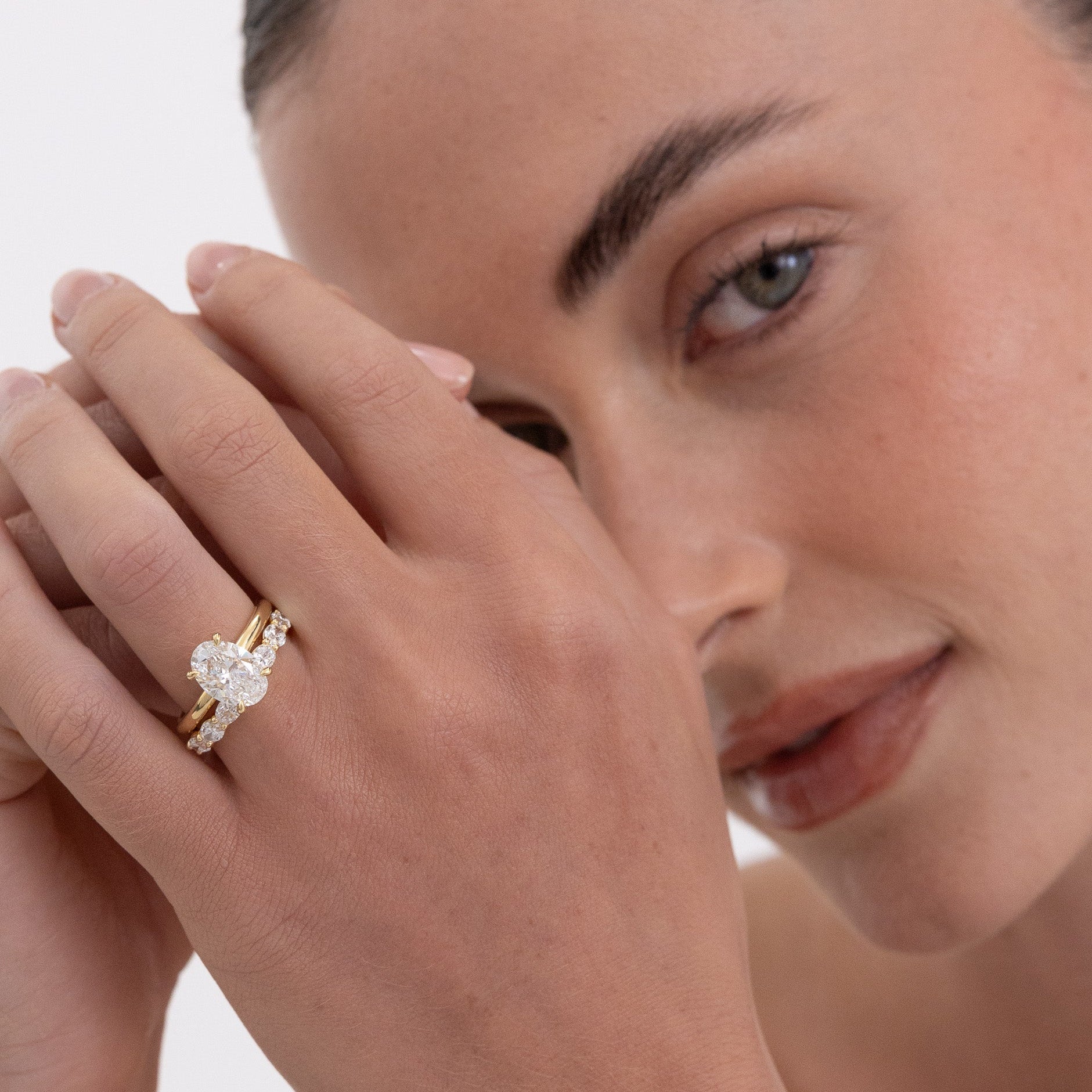 East west oval diamond wedding ring in 18K gold featuring 7 lab-grown diamonds by Matthews Jewellers Newcastle