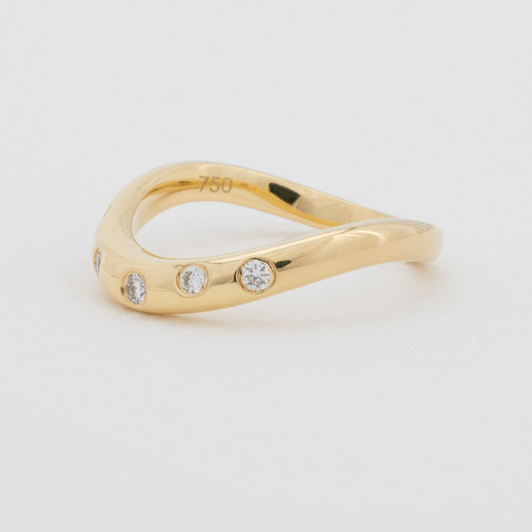 Issy curved lab-grown diamond wedding band in 18K gold from Matthews Jewellers Newcastle