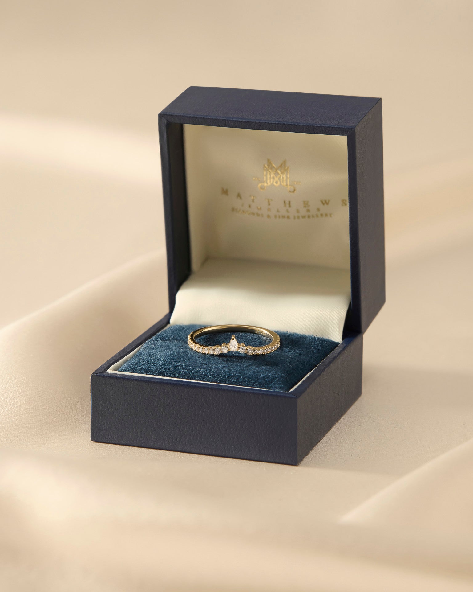Pear and Round Cut Mini Crown Diamond Wedding Ring