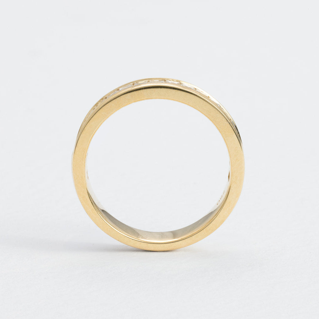 Mabel baguette diamond wedding ring crafted in 18K gold and set with 17 lab-grown diamonds