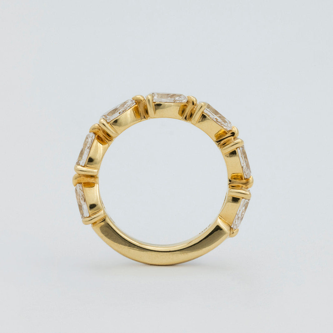 Pear Diamond Ring with 6-7 Diamonds