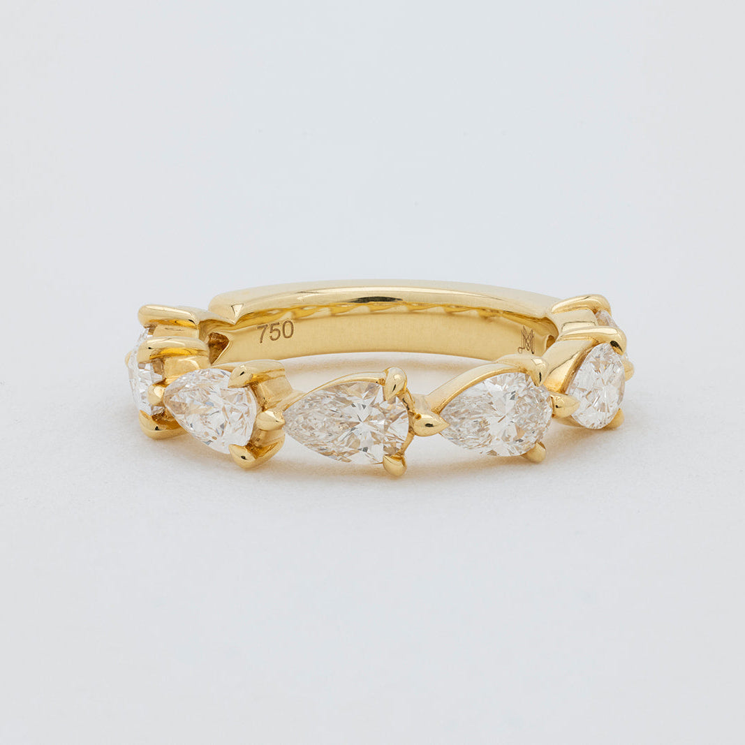 Pear Diamond Ring with 6-7 Diamonds