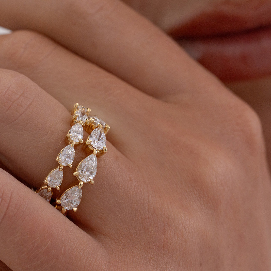 Pear Diamond Ring with 6-7 Diamonds