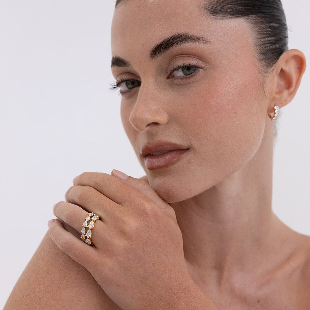 Pear Diamond Ring with 6-7 Diamonds