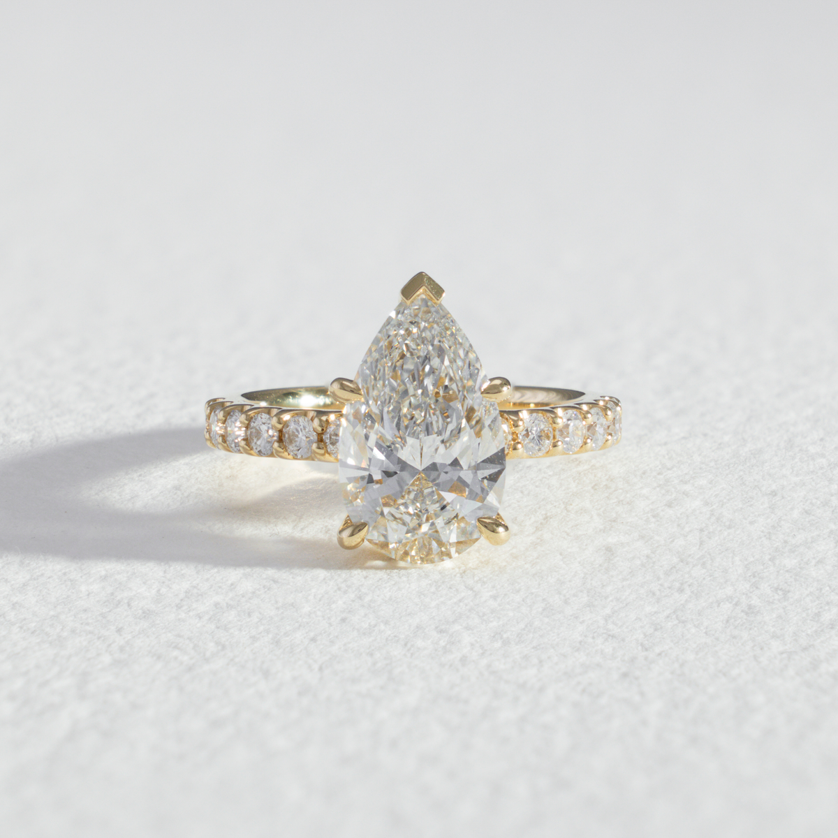 Pavé Nora | Pear Diamond Engagement Ring with Diamond Band