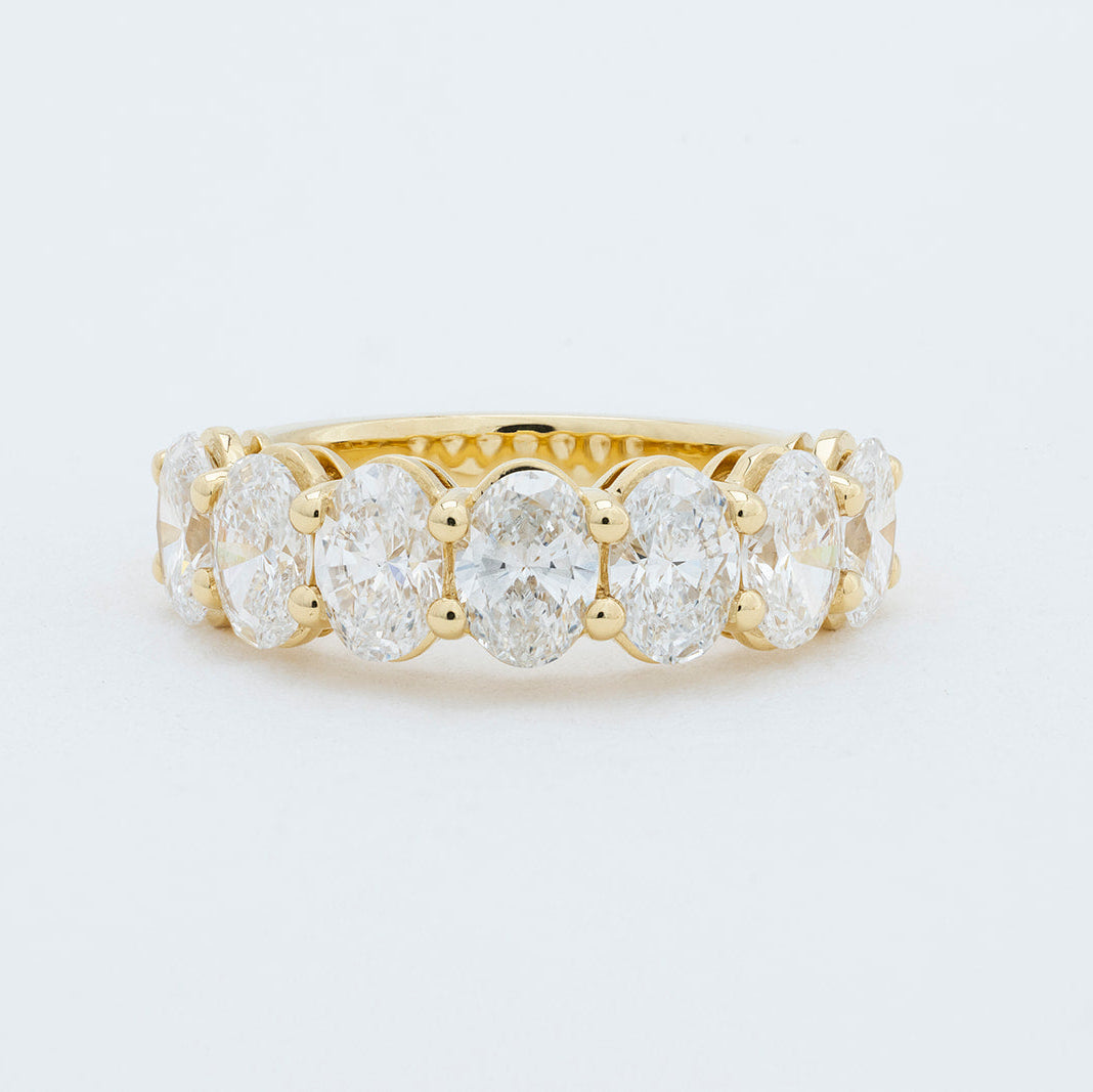 Large Rhea oval diamond wedding band crafted in 18K gold with 7 lab-grown diamonds