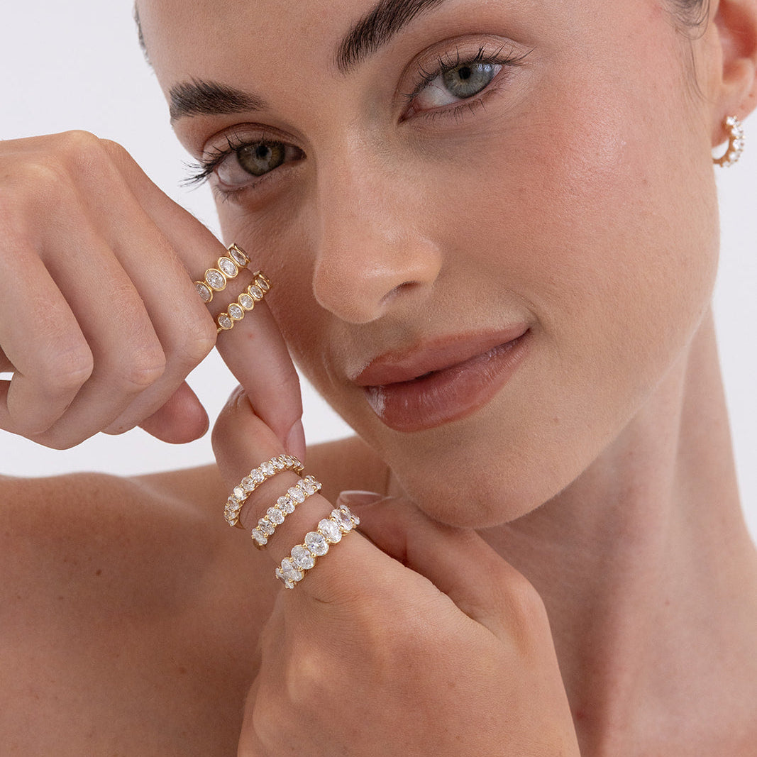 Small Amari oval diamond wedding ring in 18K gold featuring 9 lab-grown diamonds from Matthews Jewellers Newcastle