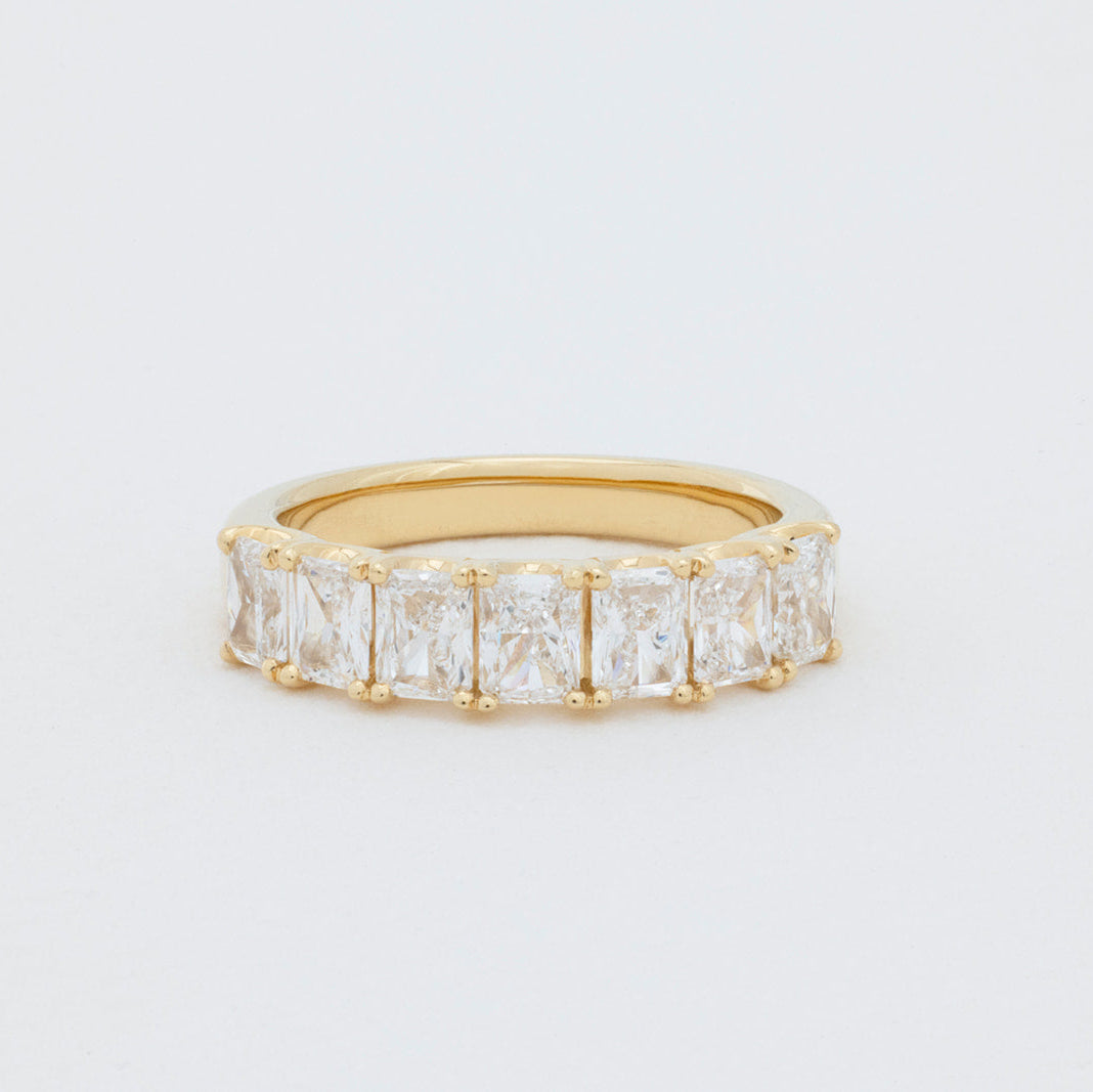 Roma radiant diamond wedding band crafted in 18K gold with small lab-grown radiant diamonds
