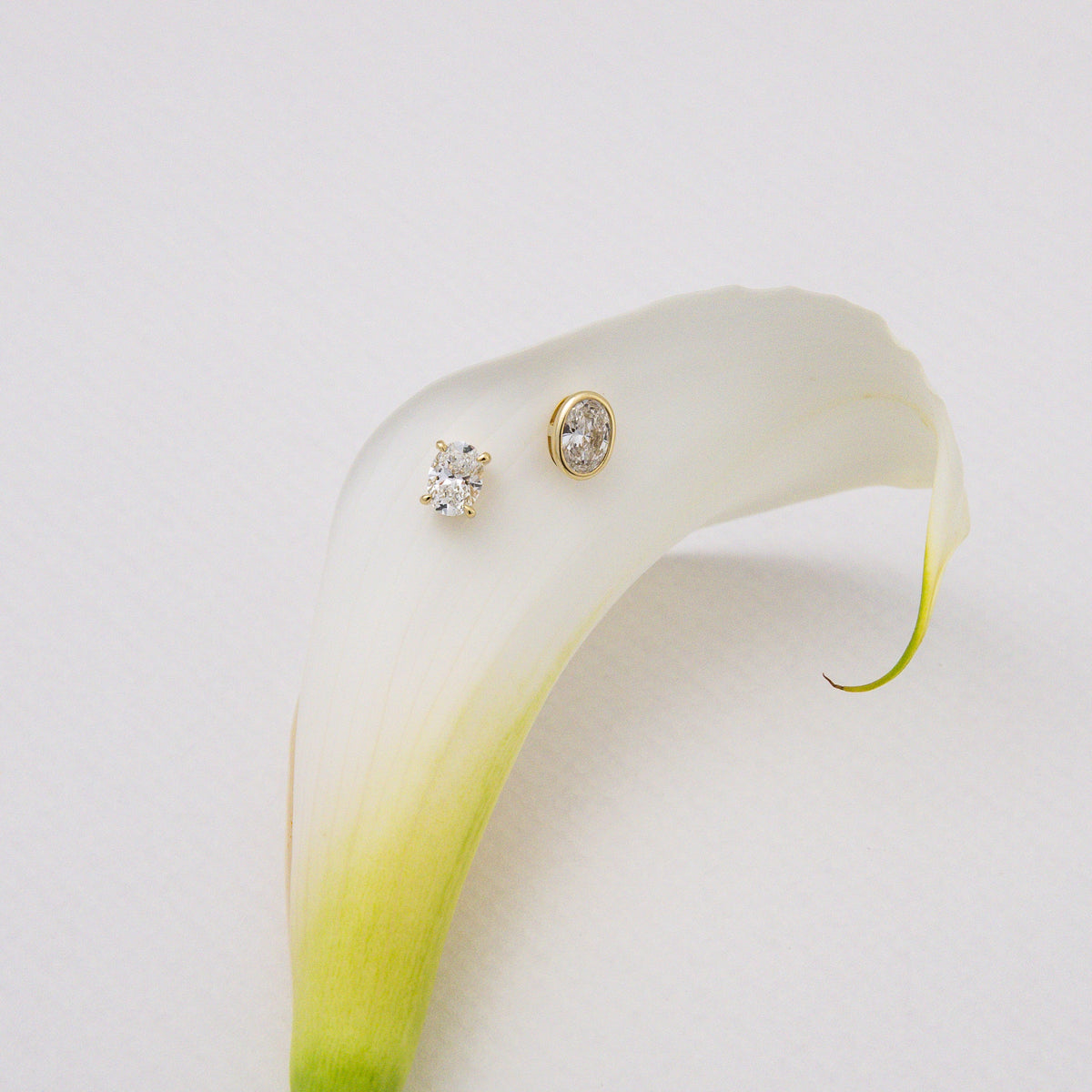 Oval Bezel Diamond Studs
