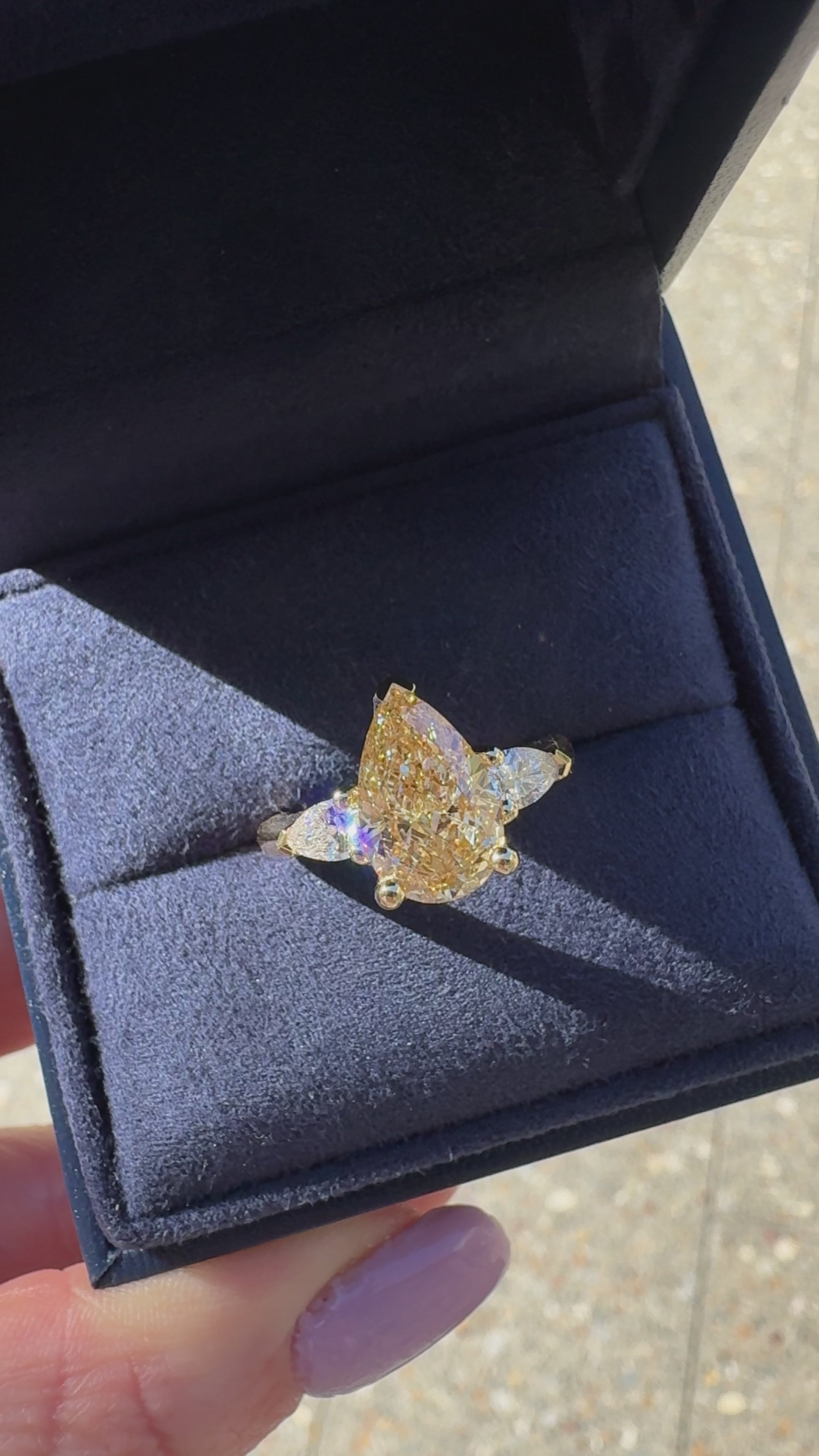 Video of Solenne 3ct fancy yellow pear lab grown three stone diamond engagement ring in 18k yellow gold, handcrafted by Matthews Jewellers